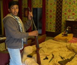 Indian Kid with Weapons Meme Template