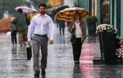 Man walking in rain woman with umbrella Meme Template
