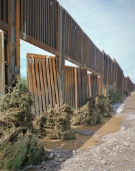 Trump's Brand New $15 Billion USD Border Wall Destroyed by Rain Meme Template