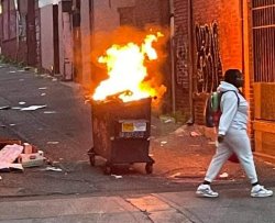 Walking Away From a  Dumpster Fire Meme Template