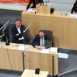 Schallenberg and Kogler with documents on the floor Meme Template