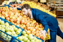 Businessman Biting Apples In Grocery Store Meme Template