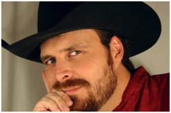serious look with cowboy hat Meme Template