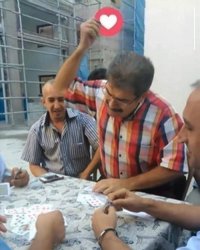 TURKISH MAN PLAYING CARDS THROWS A LOVE REACT Meme Template