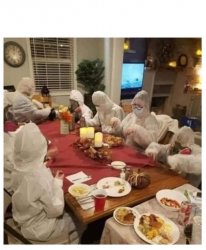 Family around table with masks Meme Template