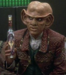 Quark Holding Bottle. Meme Template