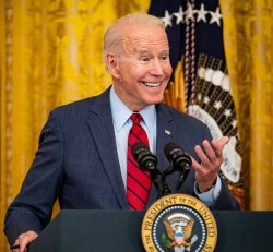 Smarmy grinning Biden Meme Template