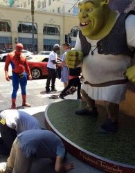 2 guys bowing down to shrek while spider man watches Meme Template