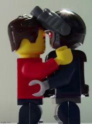 Lego man hugging a lego robot Meme Template