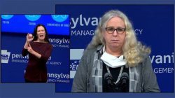 Transgender "woman" Rachel Levine with deaf interpreter Meme Template