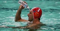 Guy in pool with a bottle Meme Template