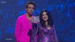 Eurovision Mika Showing a CD Meme Template