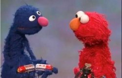 Grover and Elmo discuss trains Meme Template