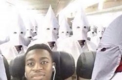 Black guy on kkk flight Meme Template
