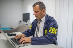FBI typing on computer Meme Template