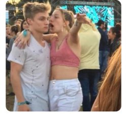 Girl Explaining to Boy at Festival Meme Template