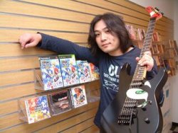 Jun senoue holding guitar plus games Meme Template