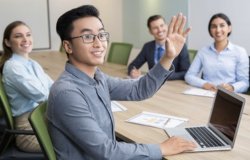 Man Raising Hand In Group Meme Template