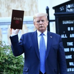 trump holding a Satanic Bible Meme Template