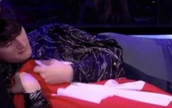 gjon going to sleep using his swiss flag as a blanket Meme Template