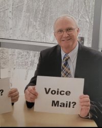 Old man holding an outdated sign pained smile Meme Template