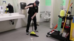 Janitor cleaning bathroom Meme Template