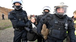 Greta Thumberg Carried by Policemen Meme Template