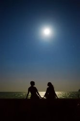 Couple on beach looking at the moonlight Meme Template