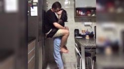 Couple kissing against fridge Meme Template