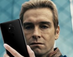 Homelander staring at phone in disappointment Meme Template