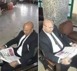 Adel Shakal reading newspaper Meme Template