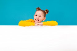 cute little girl with yellow pullover winking Meme Template