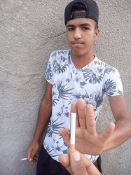 Guy Refusing Cigarette While Holding One Meme Template