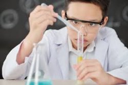 Young male science nerd doing science with test tube Meme Template