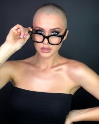 sexy bald girl with glasses Meme Template