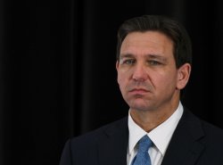 Ron DeSantis, awkward, sour Meme Template