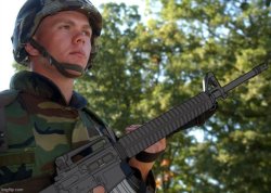 Eroican Soldier Welding an Colt M16A3 Meme Template