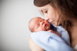 Mother holding newborn Meme Template