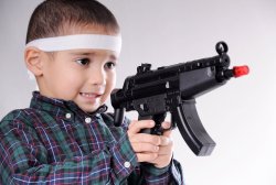 kid holding gun Meme Template
