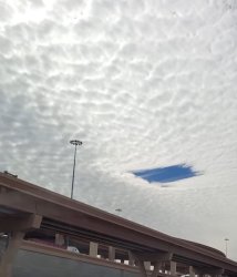 Square Hole in Sky Clouds Meme Template