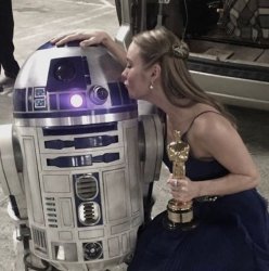 Brie Larson kissing C3PO Meme Template