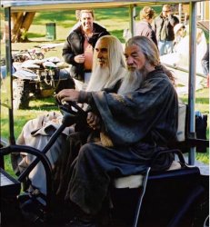Gandalf and Saruman in golf cart Meme Template