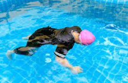 6yr old be pretending to be dead in a pool to see if anyone care Meme Template