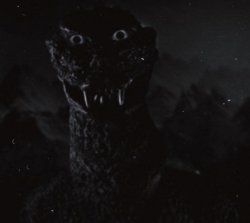 Godzilla with human eyes Meme Template