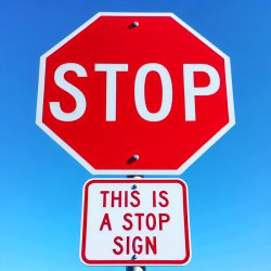 stop sign with sign "This is a stop sign" Meme Template