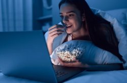 Eating popcorn while looking at computer laptop Meme Template