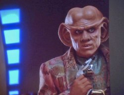 Quark with a Phaser Meme Template