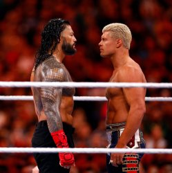 Cody Rhodes and Roman Reigns staredown at WrestleMania 39 Meme Template