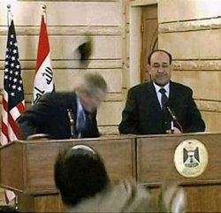 Guy Throwing Shoe At George W. Bush Meme Template