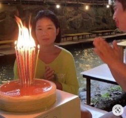woman somberly celebrating her birthday Meme Template